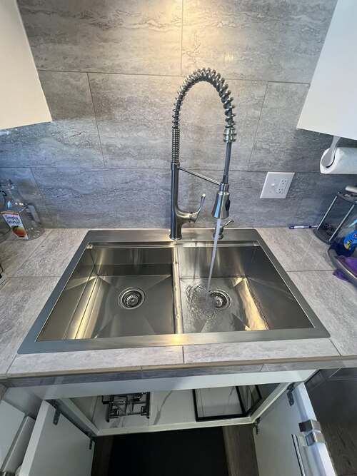 stainless steel kitchen sink and faucet