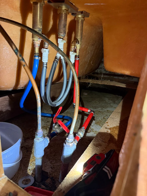 piping underneath a sink